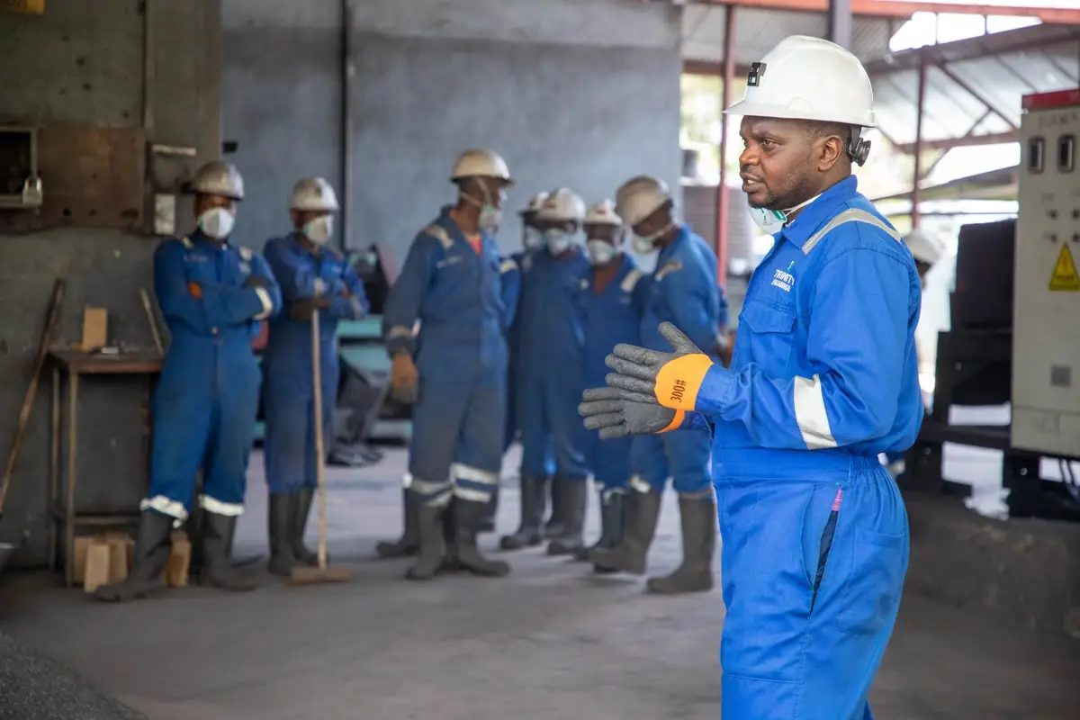 Team briefing on site in safety gear